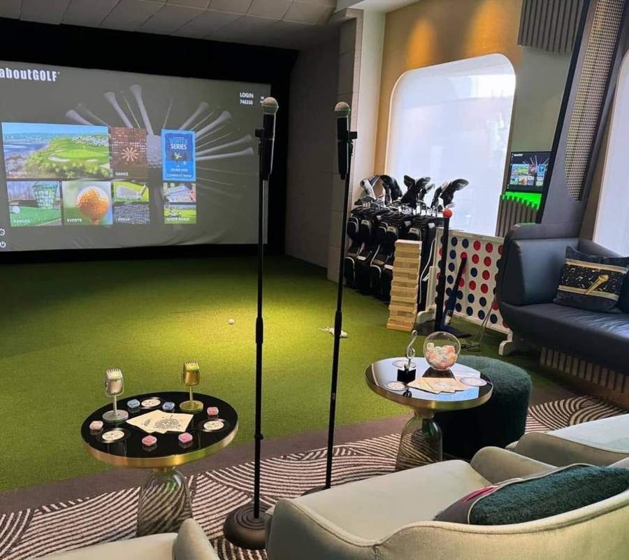 An indoor golf simulator lounge