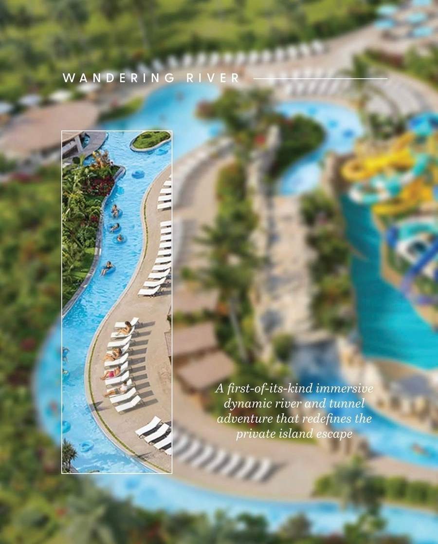 Aerial view of a winding lazy river with sun loungers